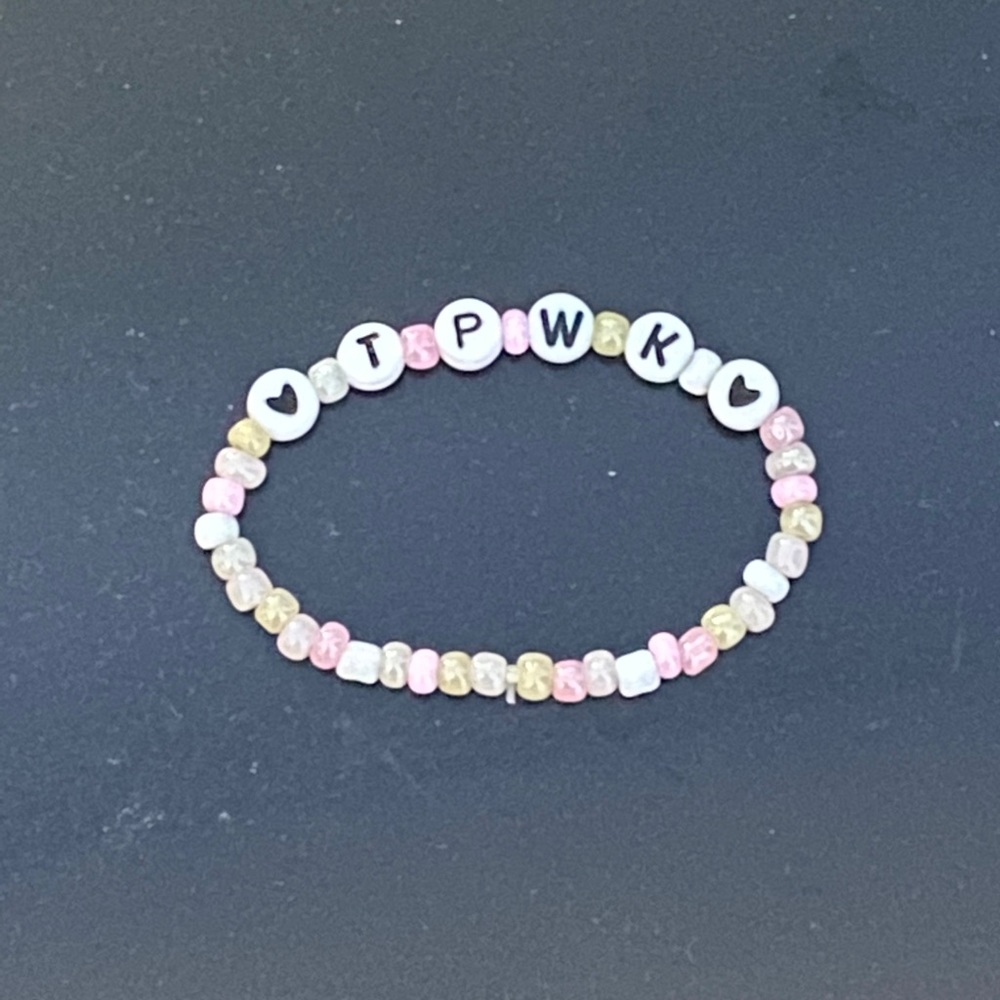 handmade "treat people with kindness" bracelet
